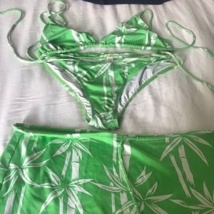 Green palm print bikini top with matching skirt